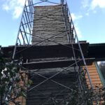 Chimney upper end rebuild and tuckpoint